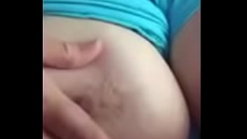 Wife playing with tit for husband