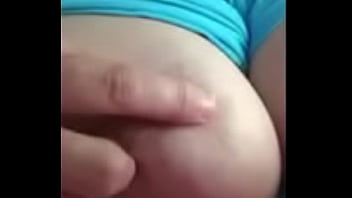 Wife playing with tit for husband