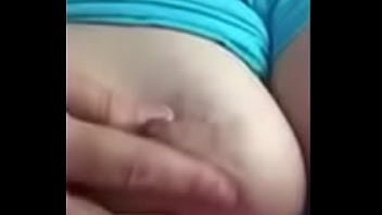 Wife playing with tit for husband