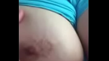 Wife playing with tit for husband