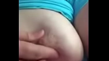 Wife playing with tit for husband