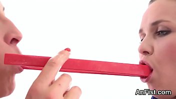 Lesbian teenie gets her shaved muff and anal fisted