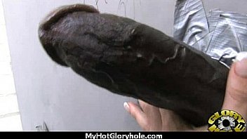 Ebony slut fucks a white gloryhole cock in her first interracial scene 16