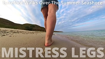 Barefoot walks over the summer seashore