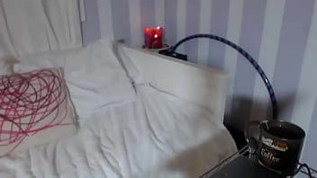 Maxine is looking good as she masturbates in that red dress