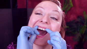 I touch my face and teeth with medical gloves