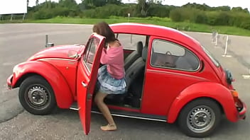 Bimba Siting Barefoot In Her Volkswagen Car Revving The Engine thumbnail