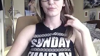 Busty girl with glasses showing her great body