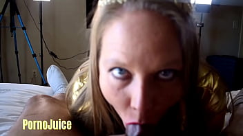 Big black man plays with a blonde disco diva