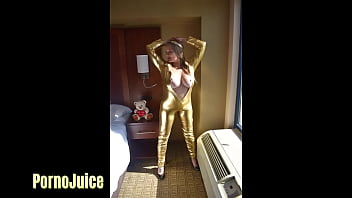 Big black man plays with a blonde disco diva