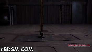 Stuffing girl with hard toy