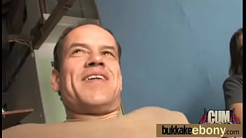 Ebony takes a facial in a club bukkake party 25