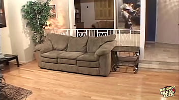 A brunette woman exposes her breasts before consenting to have her buttocks vigorously penetrated on video