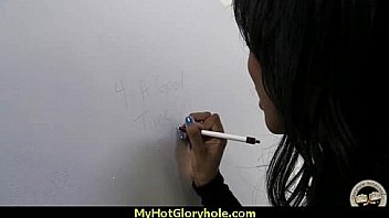 Ebony teen shows off her blowjob skills at gloryhole 21