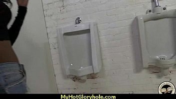 Ebony teen shows off her blowjob skills at gloryhole 21