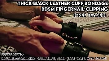Thick black leather cuff bondage bdsm fingernail clipping