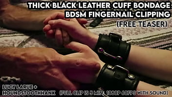 Thick black leather cuff bondage bdsm fingernail clipping
