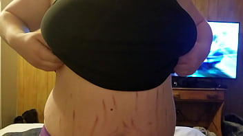 Pulling her boobs out