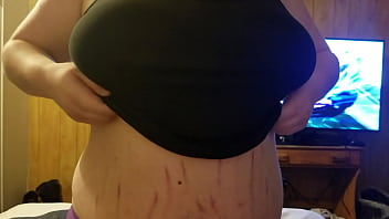 Pulling her boobs out