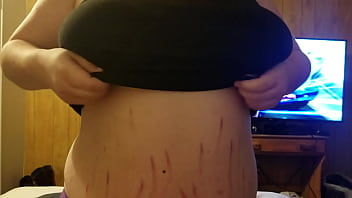 Pulling her boobs out