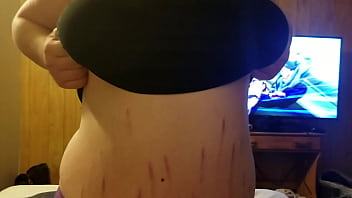 Pulling her boobs out