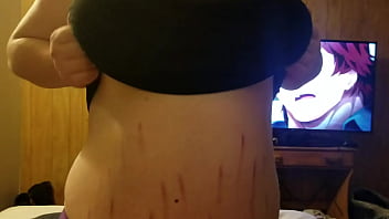 Pulling her boobs out