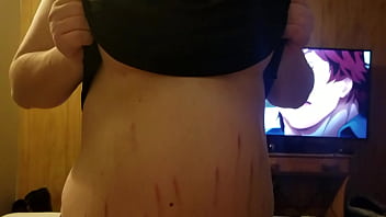 Pulling her boobs out