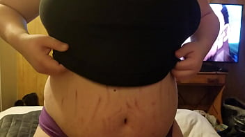 Pulling her boobs out