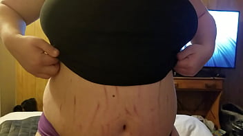 Pulling her boobs out