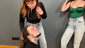 Extreme humiliation with spitting on slave's face and insults from merciless mistresses