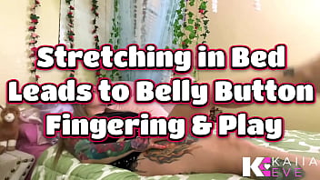 Stretching in bed leads to belly button fingering & play