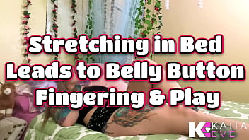 Stretching in bed leads to belly button fingering & play