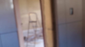 In the bathroom with the construction worker