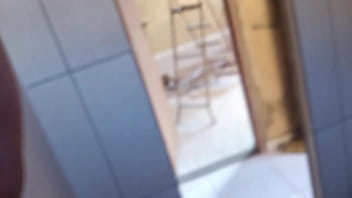 In the bathroom with the construction worker