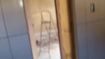 In the bathroom with the construction worker