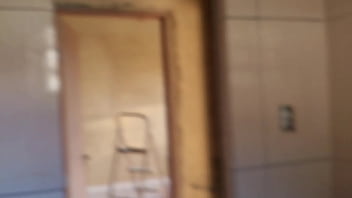 In the bathroom with the construction worker