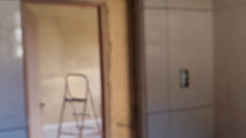 In the bathroom with the construction worker