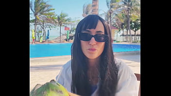 Sexy beauty girl and coconut poolside beautiful alert