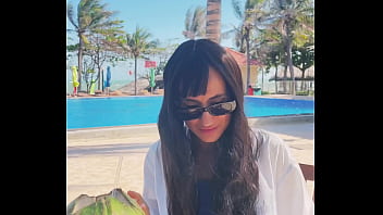 Sexy beauty girl and coconut poolside beautiful alert