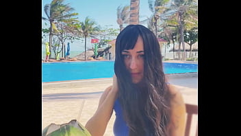 Sexy beauty girl and coconut poolside beautiful alert