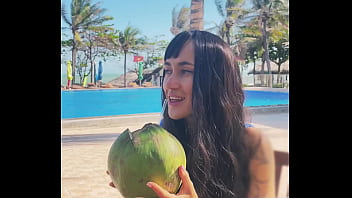 Sexy beauty girl and coconut poolside beautiful alert