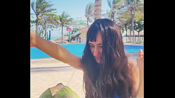 Sexy beauty girl and coconut poolside beautiful alert