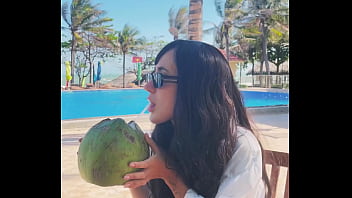 Sexy beauty girl and coconut poolside beautiful alert