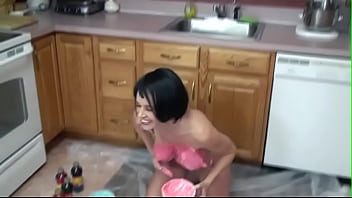 Brunette melissa swallows with big tits exhibits her body as colorful art on kitchen floor