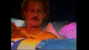 Brunette babe puts the cock between her boobs and slip it into her mouth