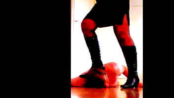 Boots trampling neck of male slave 2