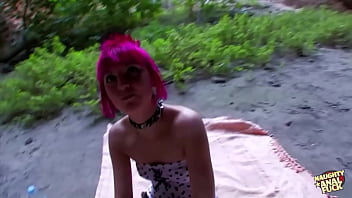 A provocative alternative woman allows an unfamiliar individual to engage in anal intercourse with her in an outdoor setting resulting in her experiencing orgasmic pleasure