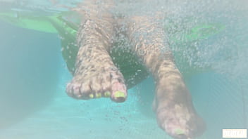 Splashing feet in the pool
