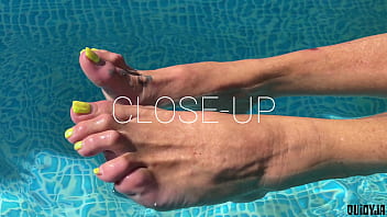 Splashing feet in the pool