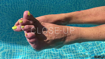 Splashing feet in the pool